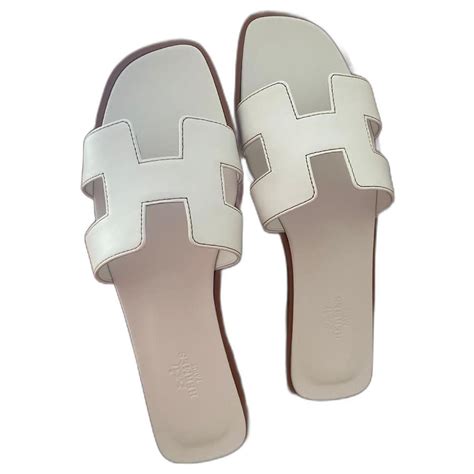 white hermes slippers|Hermes closed slippers.